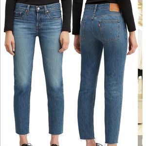 Levi’s 501 Tapered Raw Hem Jeans